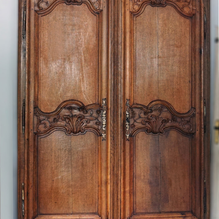 Add the strength and beauty of a French country style Armoire.